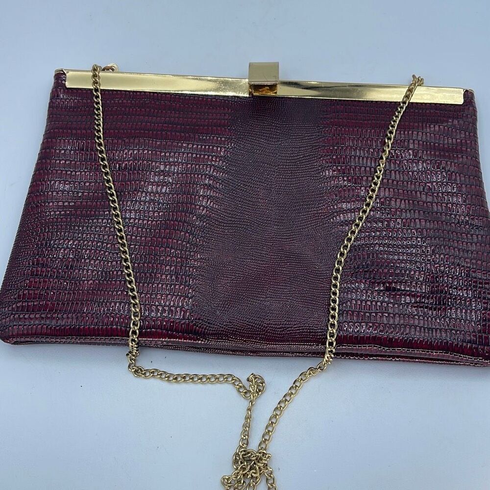 Vintage reptile embossed faux leather crossbody or clutch.